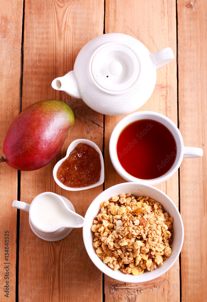 Muesli with fruit and nuts in a bowl Muesli with fruit and nuts in a bowl