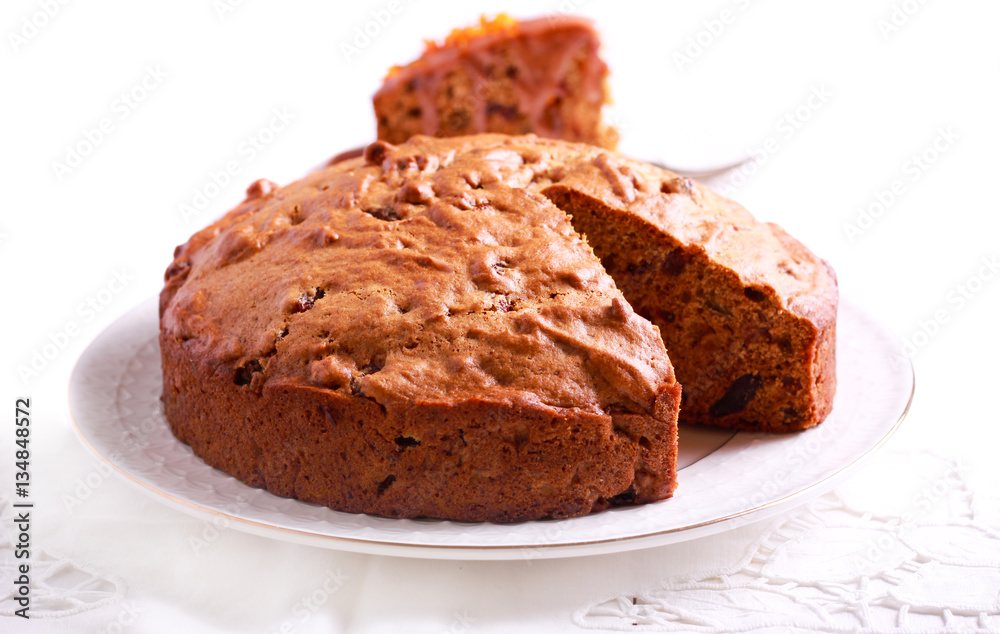 Date and raisin cake on plate