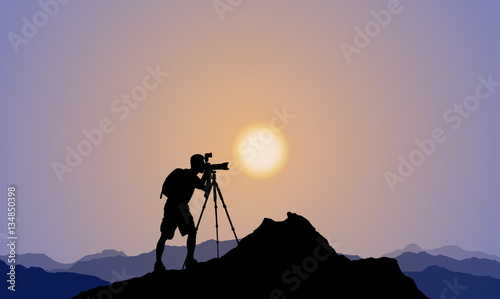 Silhouette of A Photographer, Mountain Top, Sunset  photo