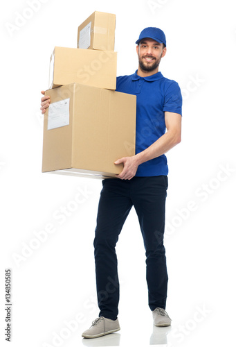 happy delivery man with parcel boxes © Syda Productions