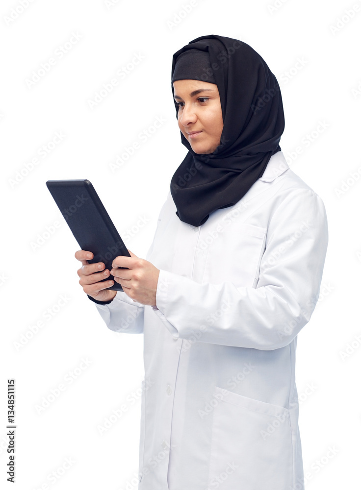 muslim female doctor in hijab with tablet pc muslim female doctor in hijab with tablet pc