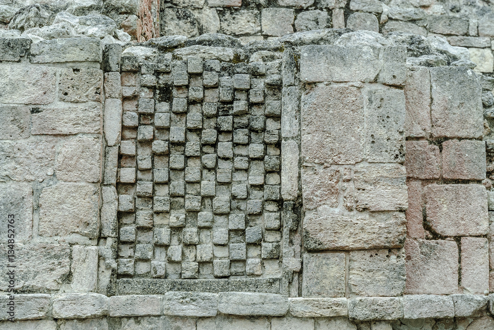 geometric decorations in the Mayan ruins of the archaeological place of Becan in the reservation of the biosphere of Calakmul in Campeche, Mexico. geometric decorations in the Mayan ruins of the archaeological place of Becan in the reservation of the biosphere of Calakmul in Campeche, Mexico.