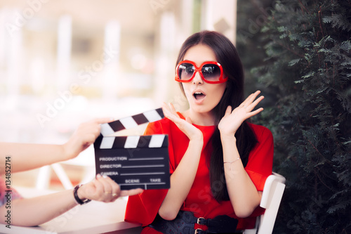 Surprised Actress with Oversized Sunglasses Shooting Movie Scene