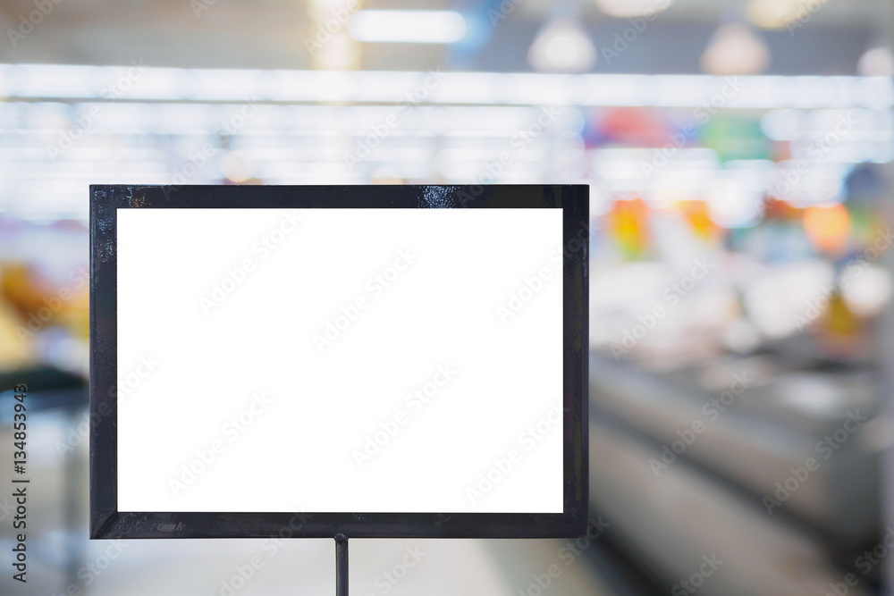 blank board with blur supermarket for background
