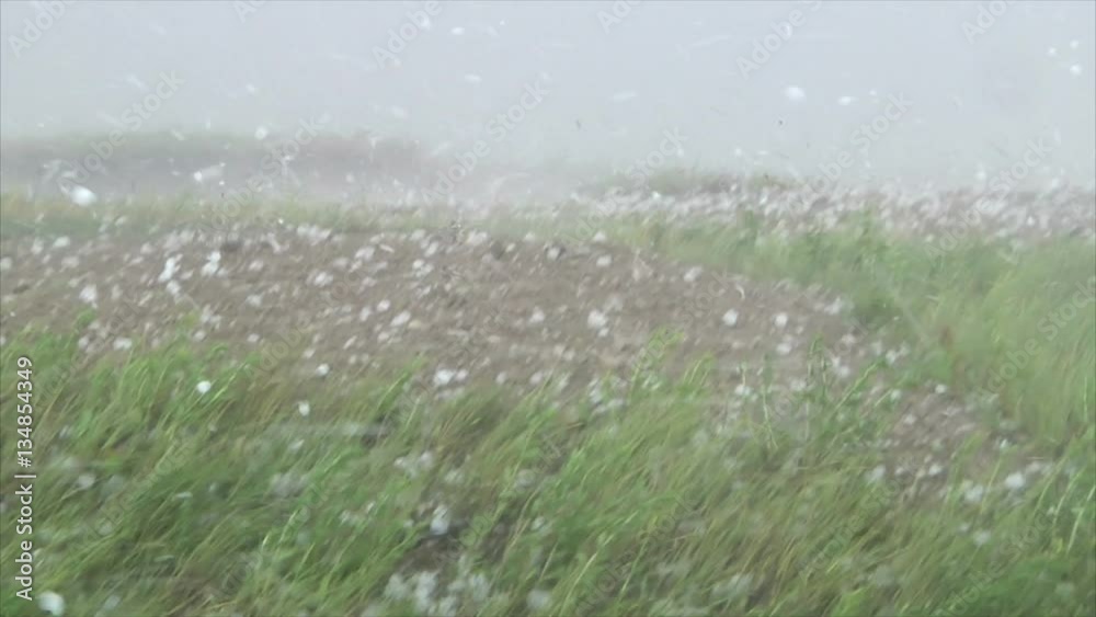 Massive Hail Strikes Thunder on Ground and Car