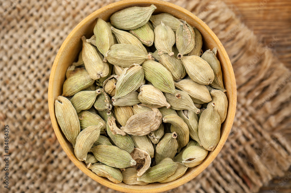 cardamom in bowl cardamom in bowl