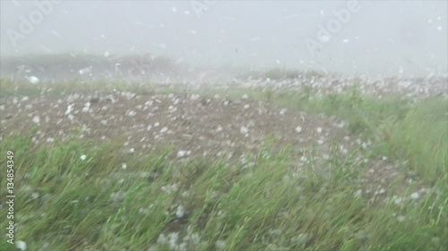 Massive Hail Strikes Thunder on Ground and Car