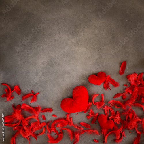 Valentine's Day - red hearts on a gray background