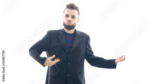 Funny bearded man in suit imitating play on guitar, studio isolated on white background.