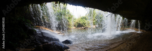 Behind the waterfall
