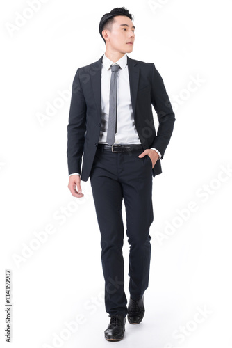 Asian businessman walk