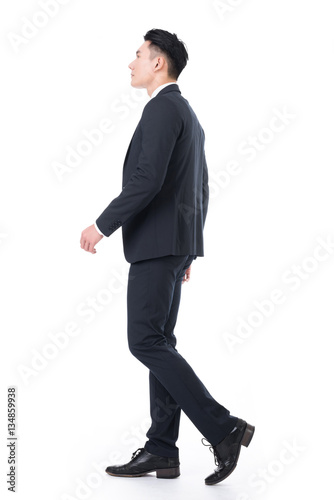 Asian businessman walk