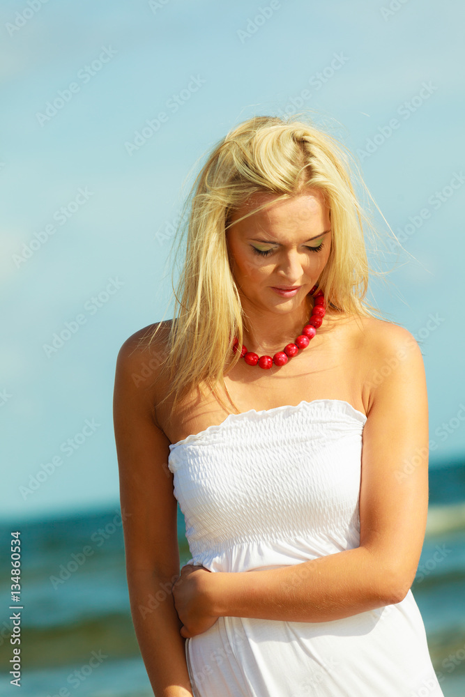 Nice female enjoying nature and beach.