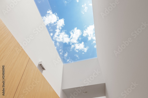 Hallway with a big skylight photo