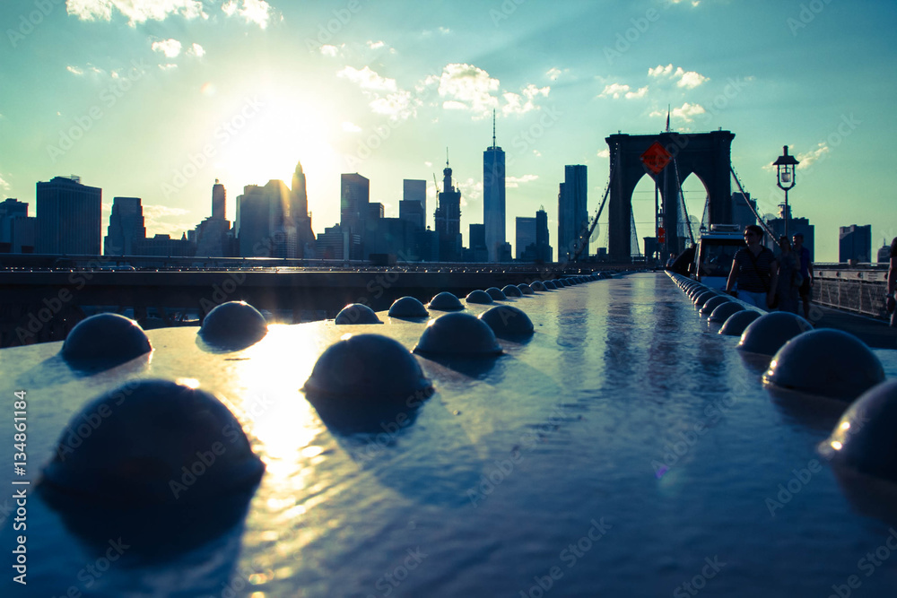 Fototapeta premium Structure of Brooklyn bridge with sunset in vintage color style, New York