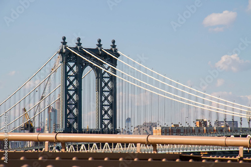 Manhattan bridge and cable with blue sky, New York © Spinel