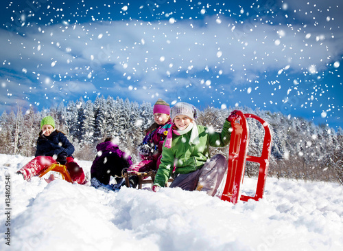 group of chidren playing in snow