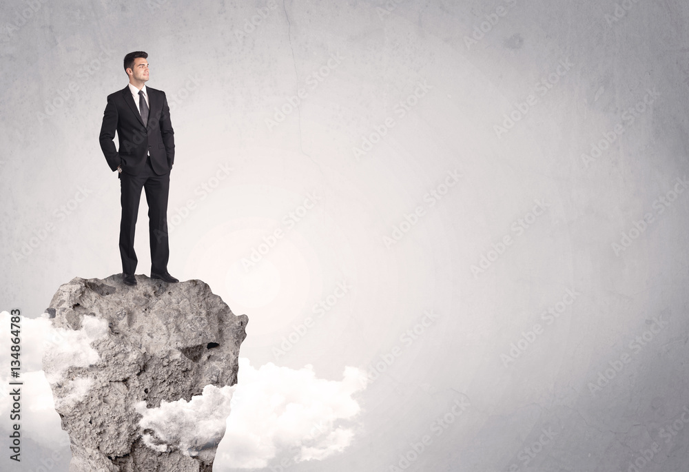 Best salesman on cliff in clear space Best salesman on cliff in clear space