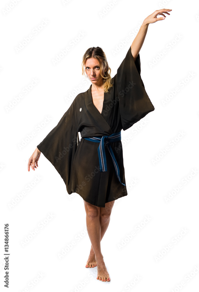 Blonde woman dressed with asian dress Blonde woman dressed with asian dress