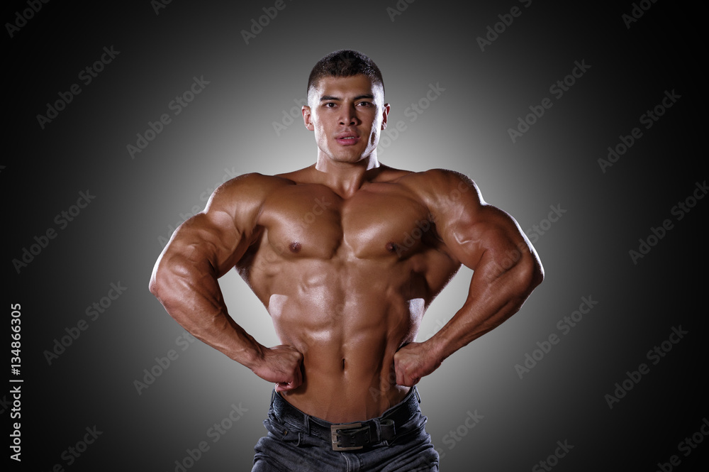 Fototapeta premium Handsome bodybuilder posing