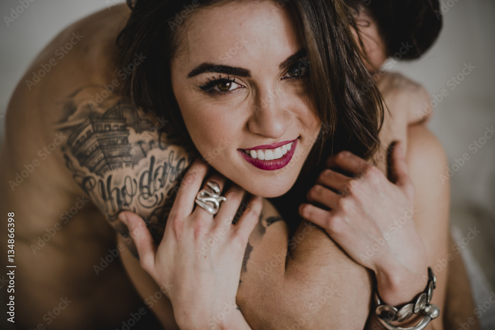 © ADDICTIVE STOCK - Embraced woman looking at camera © ADDICTIVE STOCK - Embraced woman looking at camera