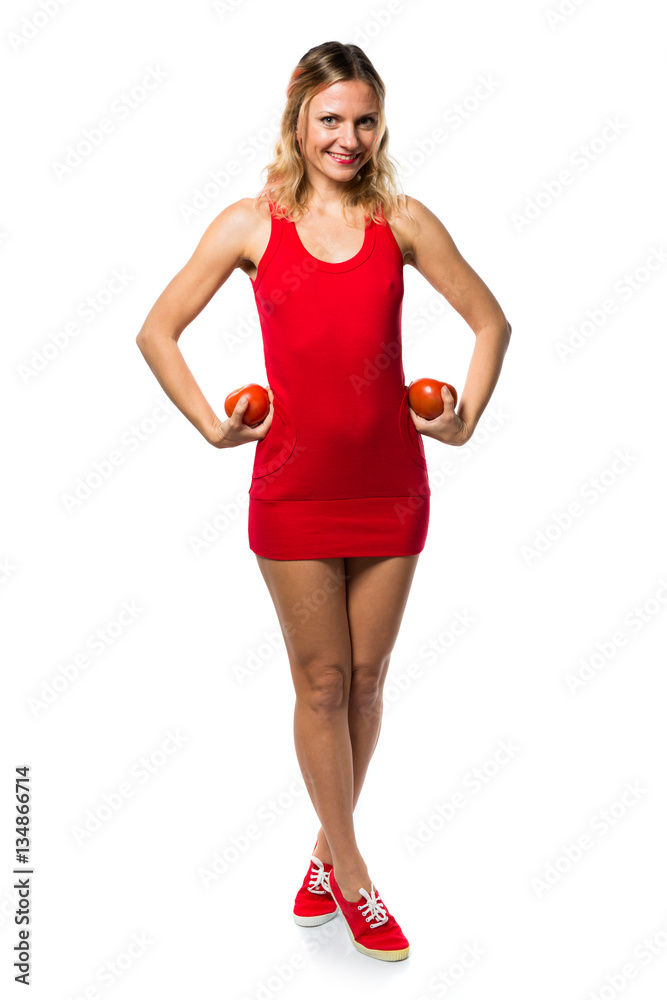 Fototapeta premium Beautiful blonde woman holding tomatoes