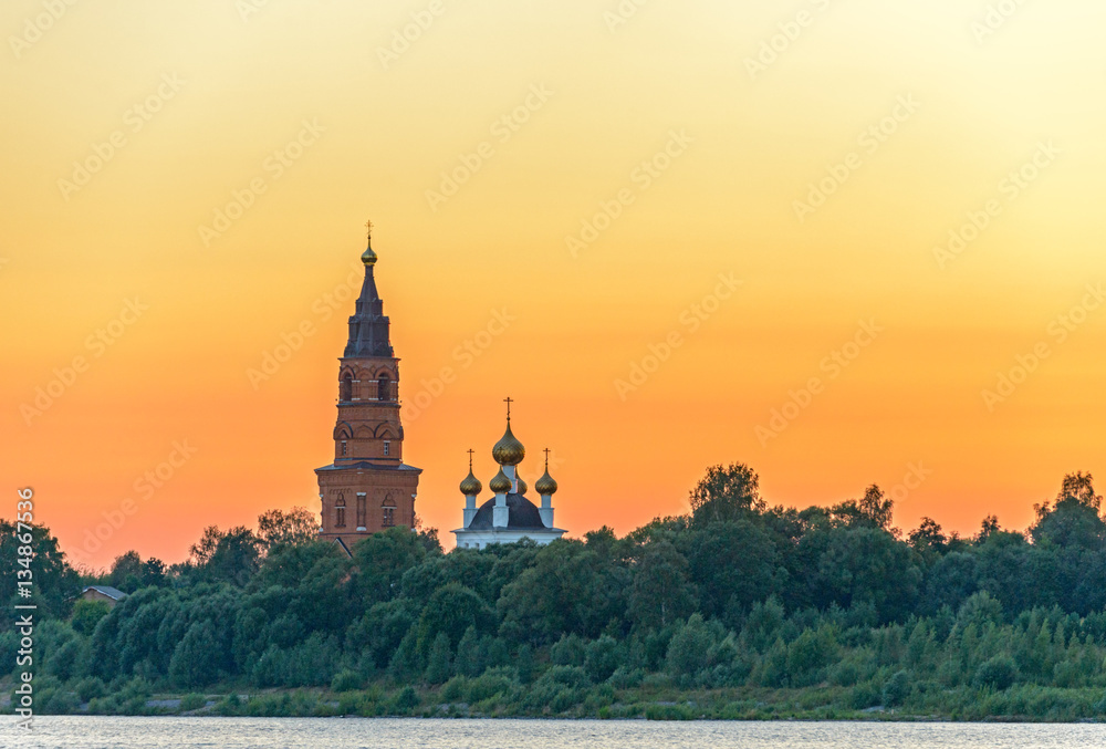 Old orthodox cathedral over sunset sky