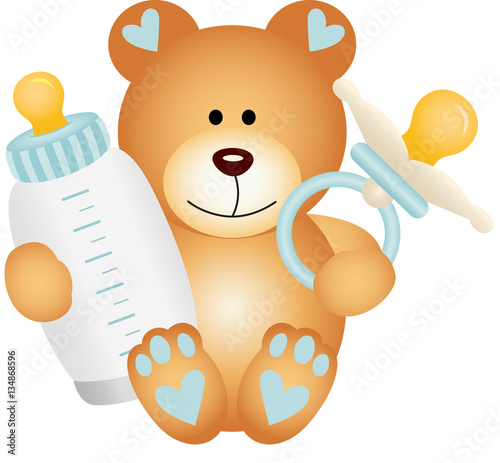 Baby boy teddy bear with baby pacifier and bottle milk