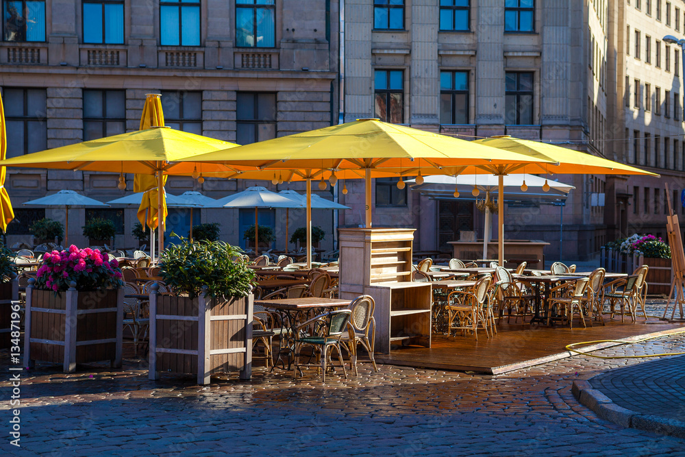Cozy outdoor cafe in old town of Riga, Latvia