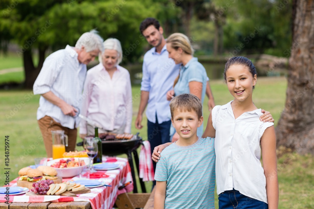 Family enjoying together in park Family enjoying together in park