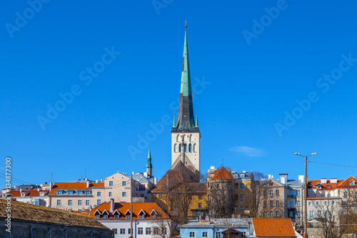 Beautiful St. Olaf church and houses of old Tallinn