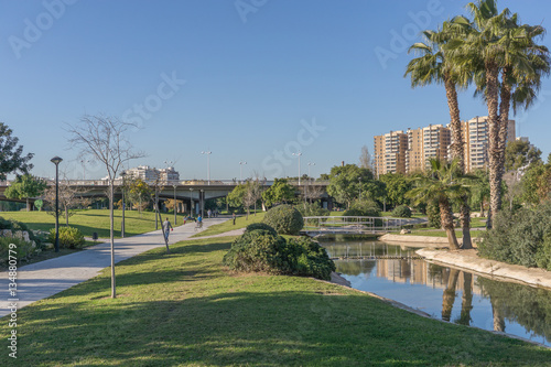Turia River gardens Jardin del Turia, leisure and sport area. Pedestrian walk way and artificial water channel. Valencia, Spain © Pb