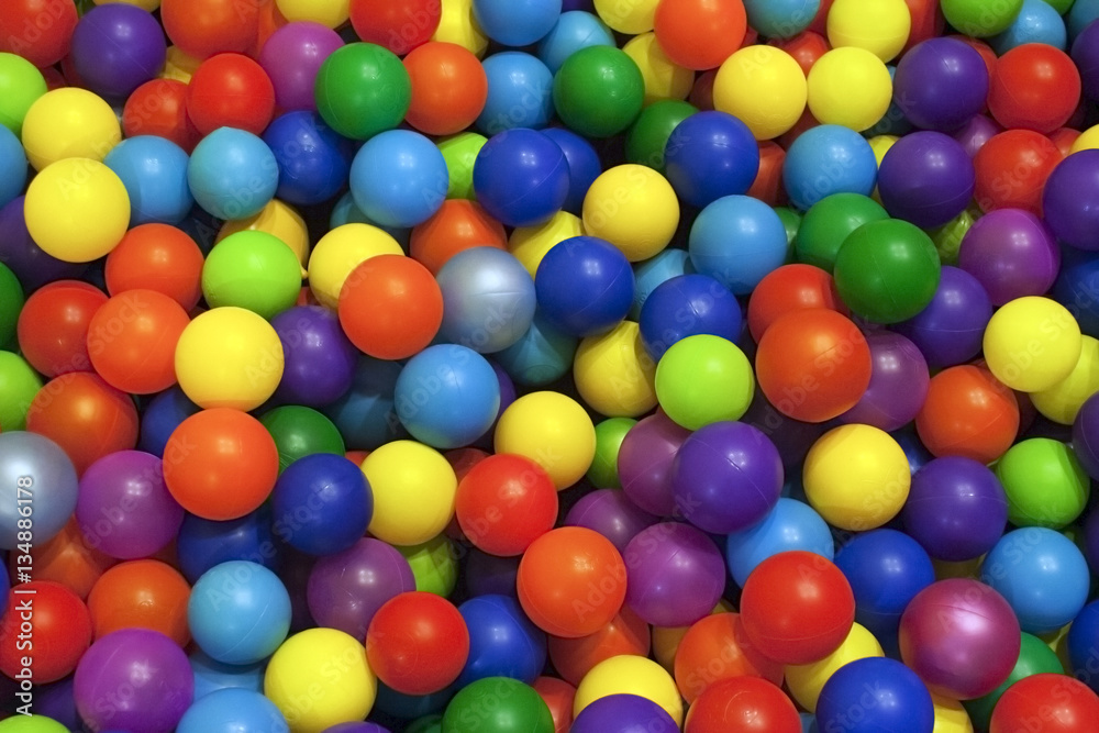 Children's playroom. Bright colored balls of plastic for baby dr Children's playroom. Bright colored balls of plastic for baby dr