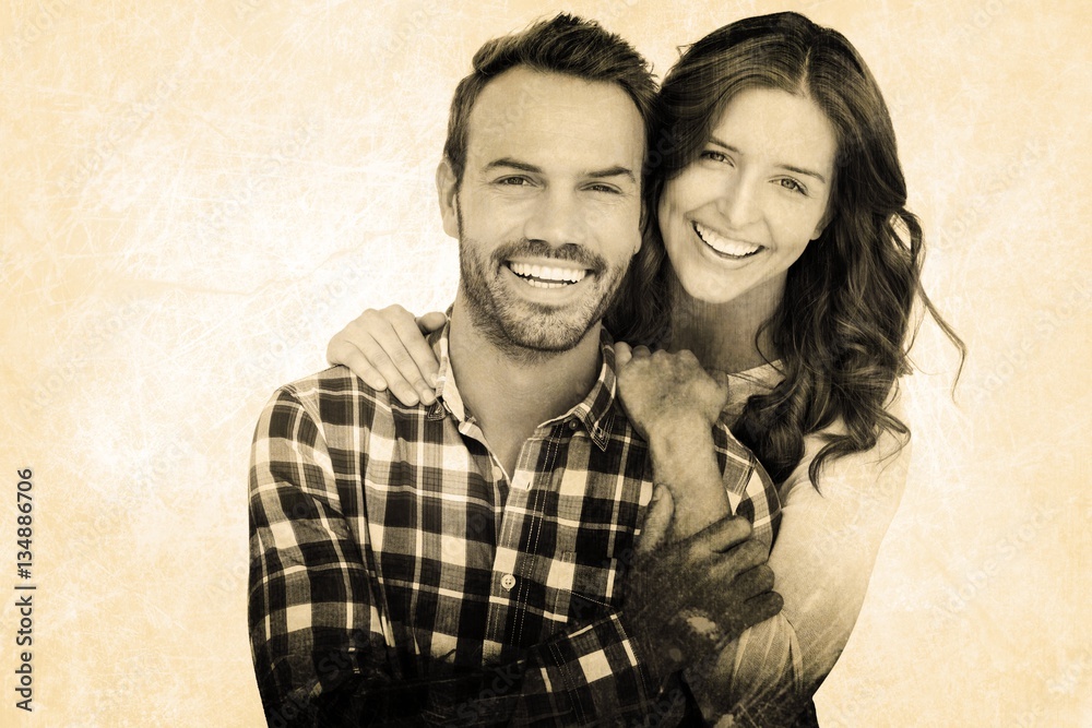 Composite image of portrait of young couple smiling Composite image of portrait of young couple smiling