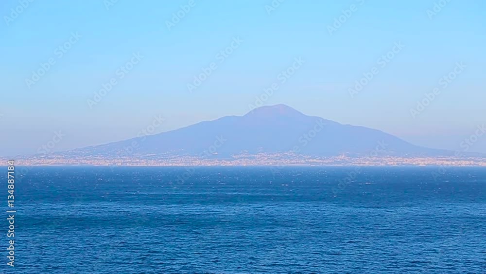 view of the blue sea and the volcano in the distance. view of the blue sea and the volcano in the distance.