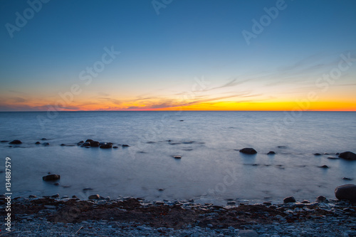 Sunrise on Baltic sea. Rocky coast of Estonian island
