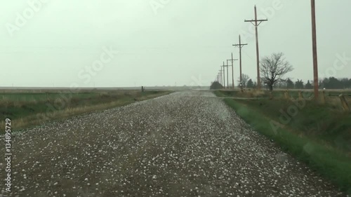 Big Hail Hits Car and Roadway