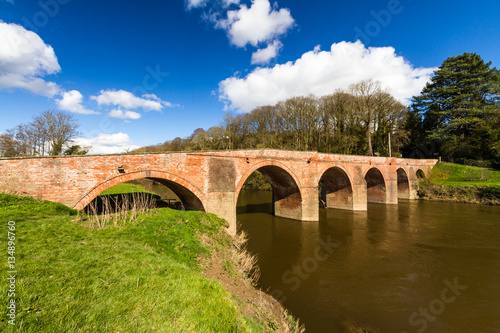 Bredwardine Bridge, red brick crossing river Wye