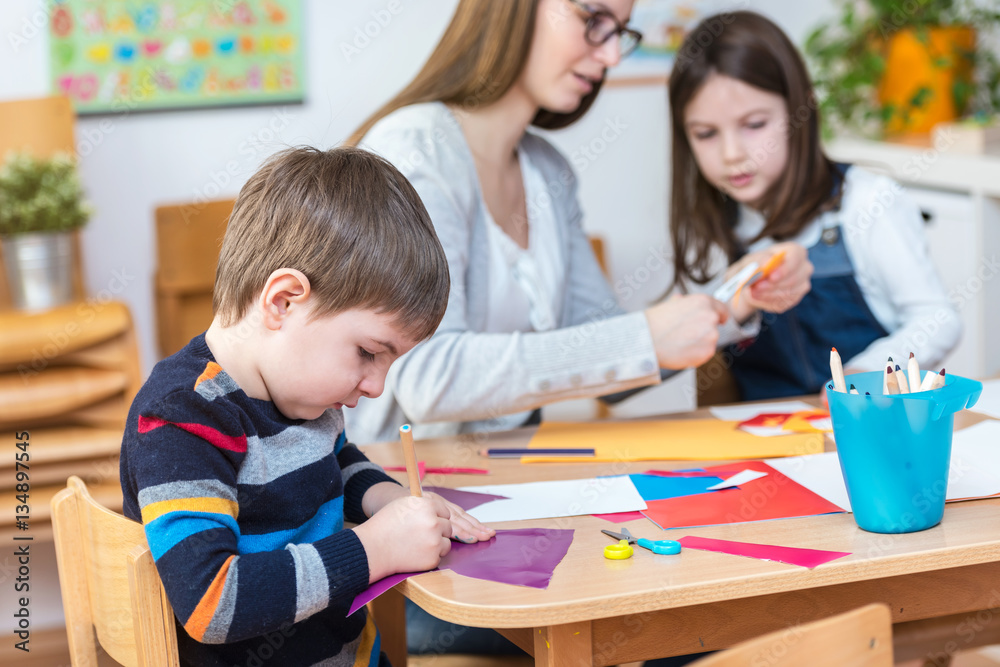 Fototapeta premium Cute Boy on Kindergarten Arts and Crafts Creative Activities