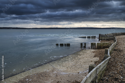 Moody sea landscape looking across Solent to Isle of Wight in En