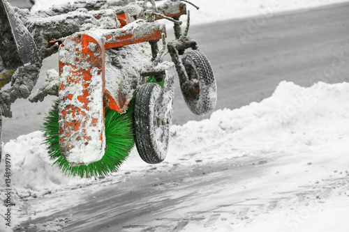 Snow plow outdoors cleaning street photo