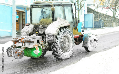 Snow plow outdoors cleaning street photo