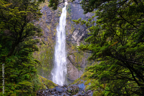 Landscape view of Devil's punchbowl waterfall, Arthur's pass, NZ