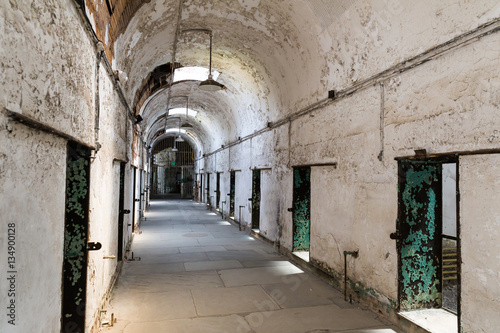 Old prison interior with brick walls