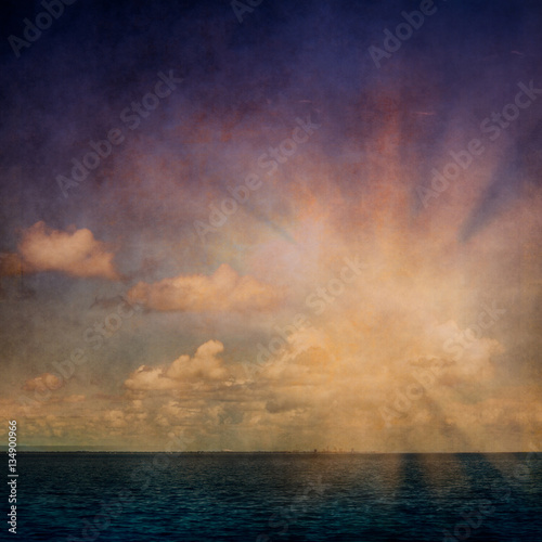 Sky, clouds and ocean with vintage grunge texture © littleny