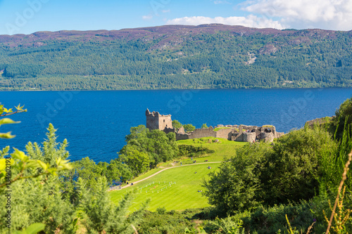 Urquhart Castle along Loch Ness lake photo