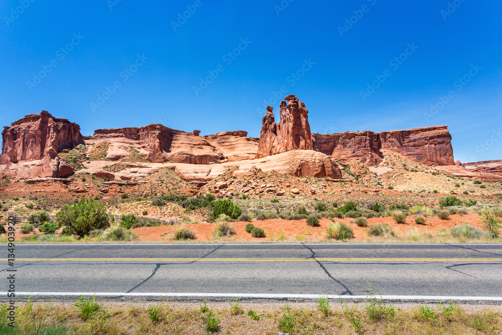 Road against sandstone mountains