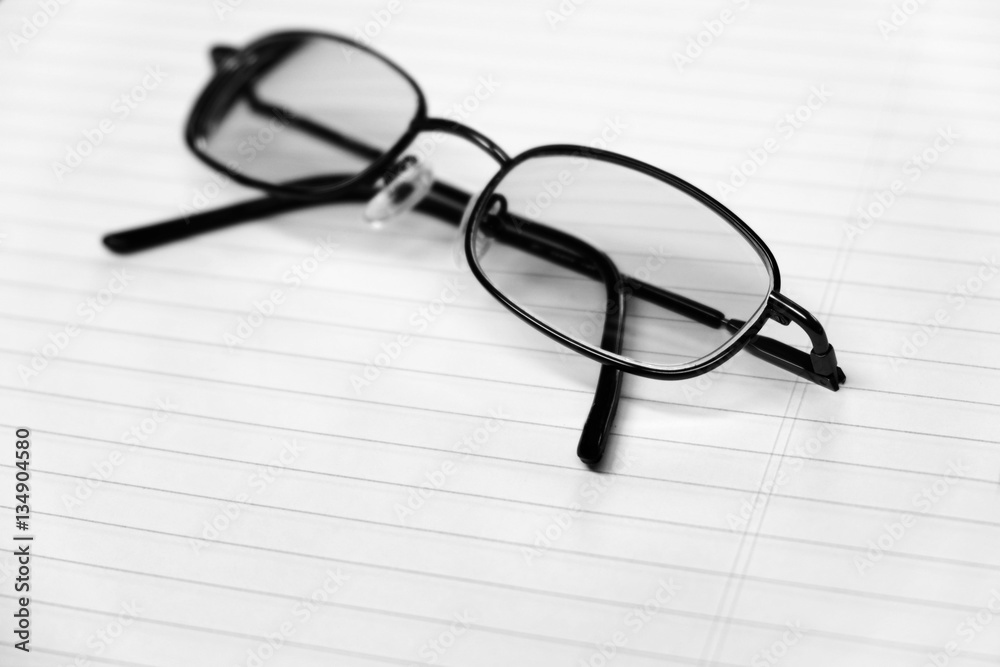 Glasses on Notebook for Business or Studying Glasses on Notebook for Business or Studying