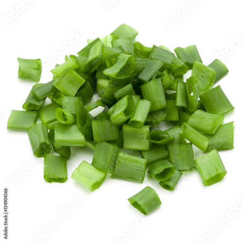 chopped spring onion or scallion isolated on white background cu