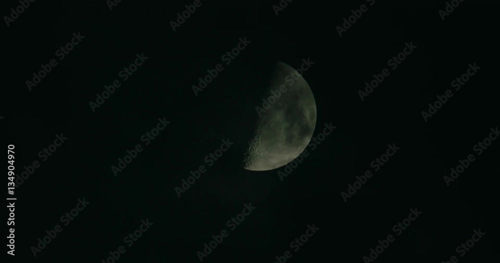 half moon in ominous clouds 4k half moon in ominous clouds 4k